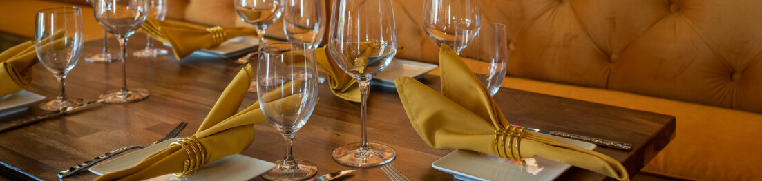 A dining table and seating bench.