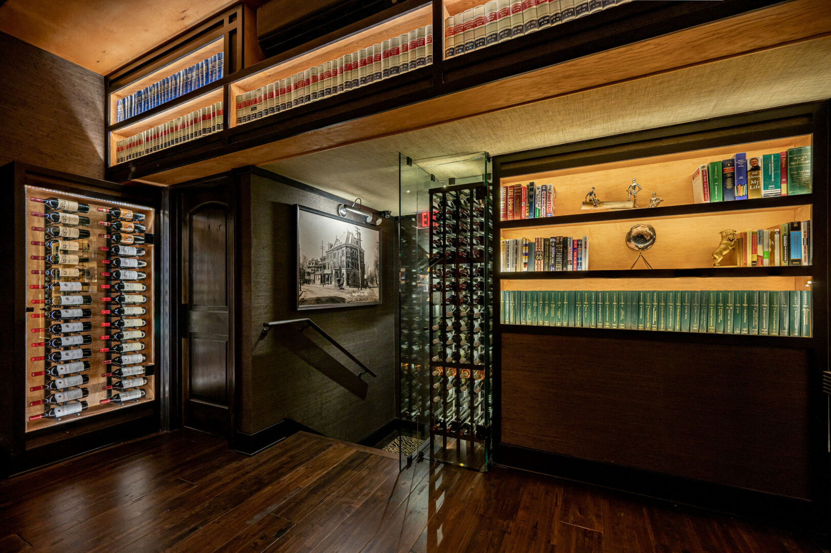 Overlooking a wine case and a selection of books.