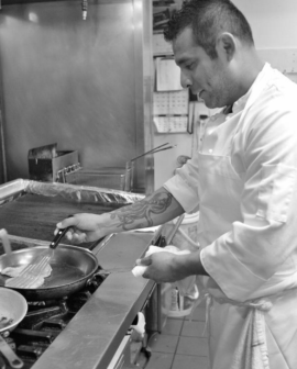 Head Chef Juan Mercado cooking.