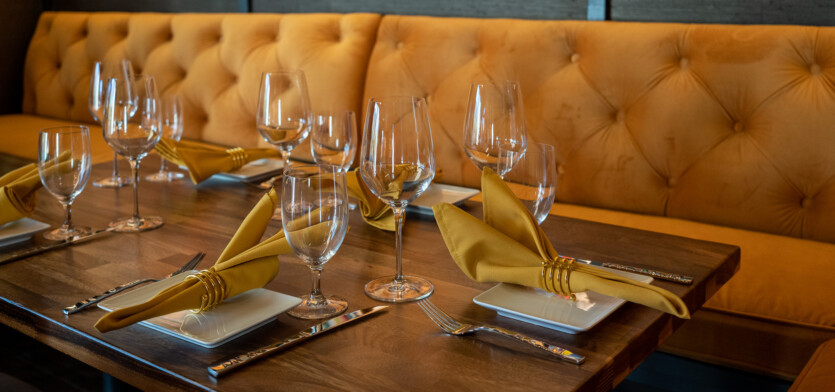 A dining table and seating bench.